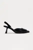 Vault Buckle Pumps